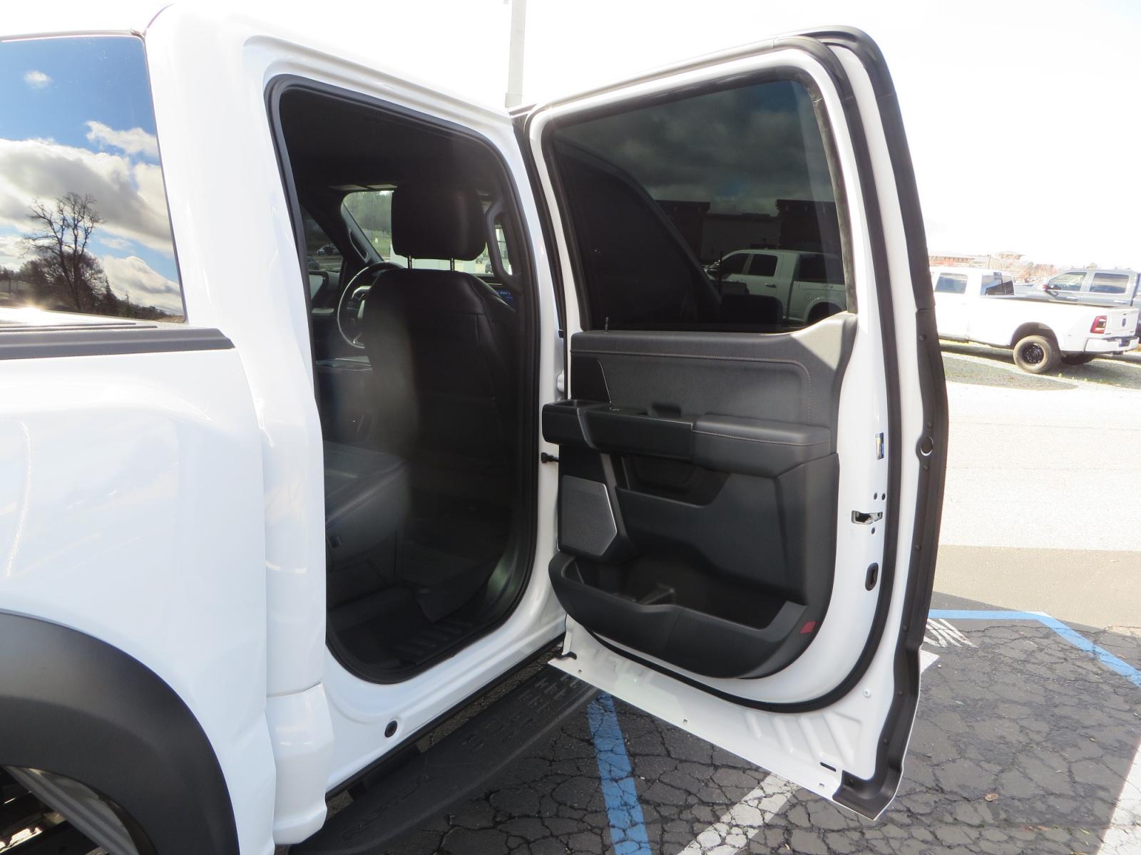 2023 White /BLACK Ford F-150 Raptor SuperCrew 4WD (1FTFW1RG6PF) with an 3.5 V6 engine, 6A transmission, located at 2630 Grass Valley Highway, Auburn, CA, 95603, (530) 508-5100, 38.937893, -121.095482 - Raptor sitting on Eibach front and rear springs, 37" Nitto Ridge Grappler tires, 17" Method NV wheels, and window tint. - Photo #52